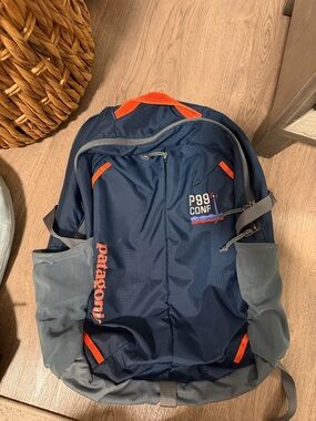 Patagonia Navy and Orange Kids Backpack with Gray Accents